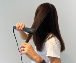 flat iron on wet hair